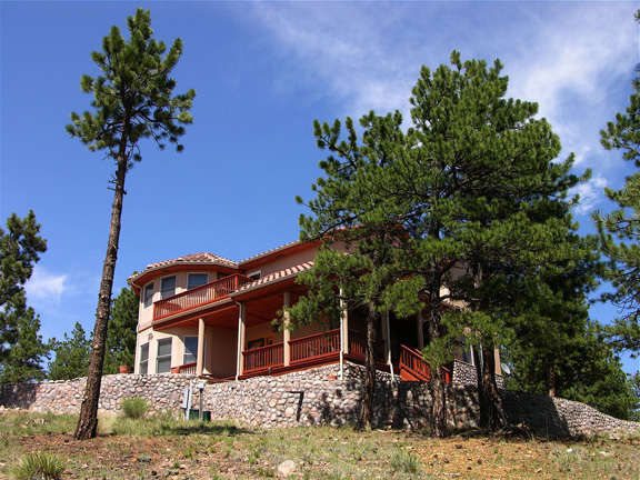 Covered Porch with stone apron around main residence..........