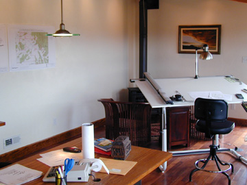 Architect's Office integrated into the Workshop....... A Woodstove and hardwood floors made of wood from Africa add to the atmosphere..........