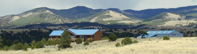 The main Ranch House and Barn looking to the East.......